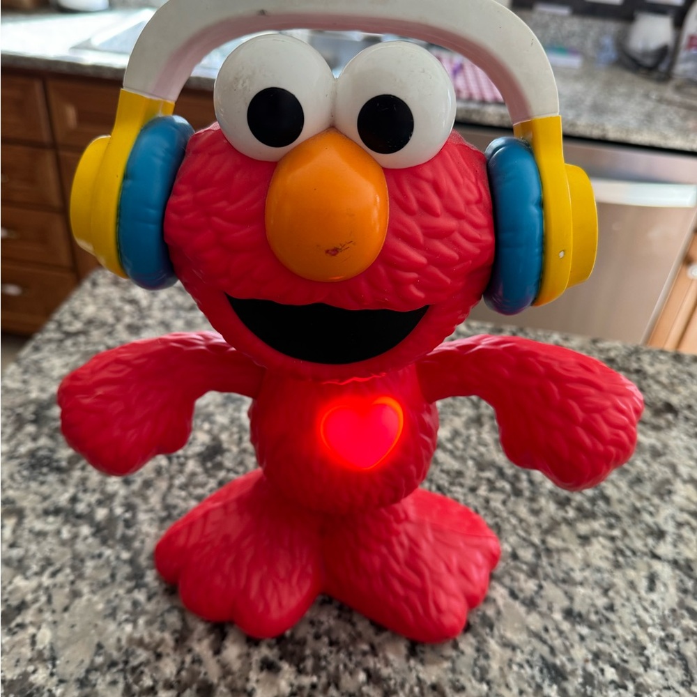 Sesame Street Elmo Light-Up Figure with Headphones